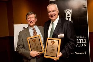 Jake Maguire ’69, left, and Matthew Leonard ’92 with their awards