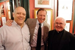 Father McPhail joins two alumni from London at the reception, Stephen A. Matteo ’86, left, and Filippo Guerrini-Maraldi ’86. 