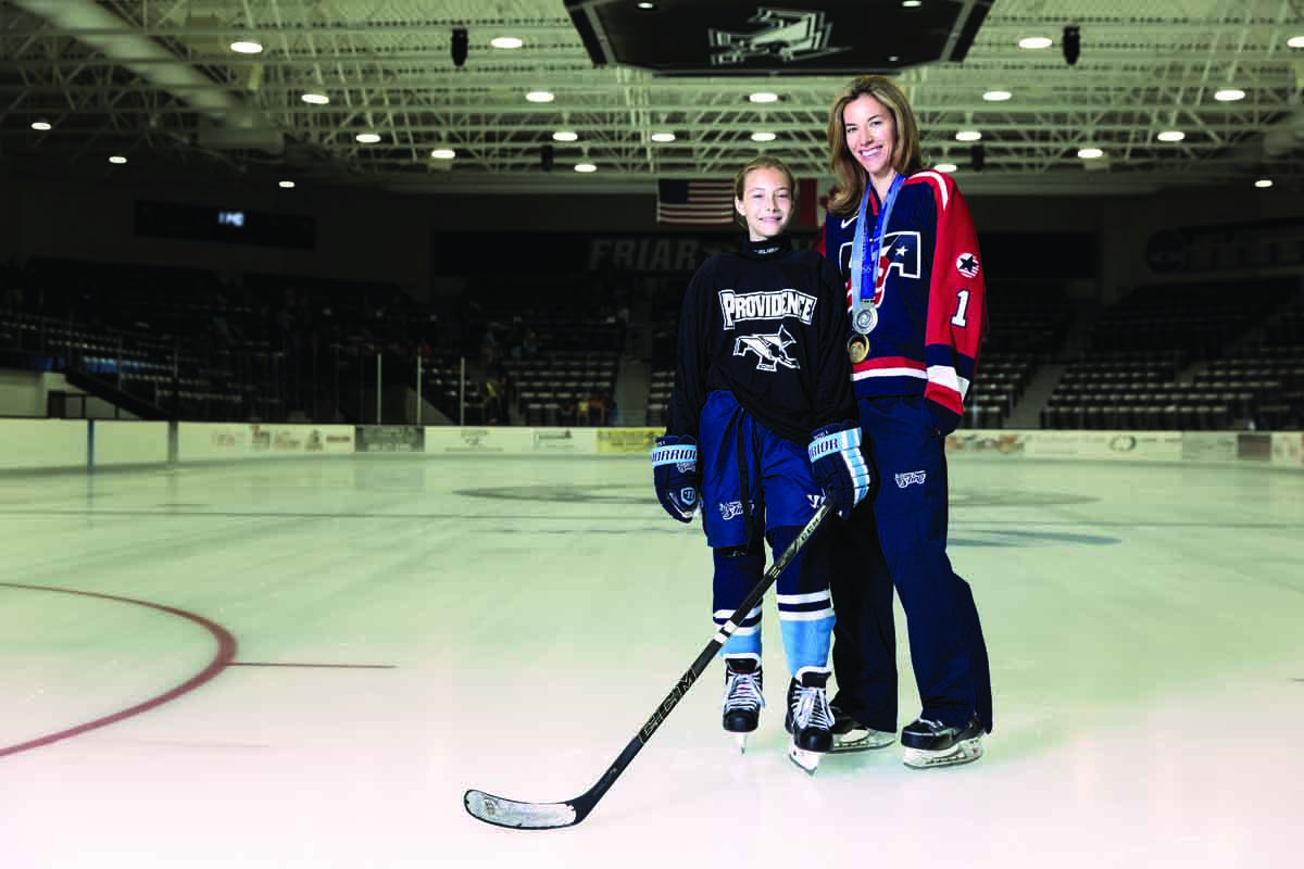 Sara DeCosta-Hayes '00 and her daughter, Kiley, on the ice at Schneider Arena.