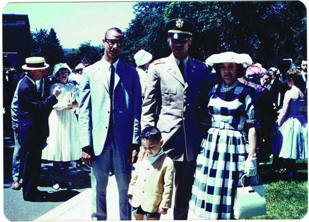 Wilkens, in his ROTC uniform at commencement, with his mother, Henrietta, and brothers. 