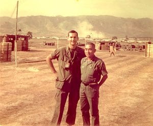 Doyle, left, with a South Vietnamese army colonel during the war in 1962.