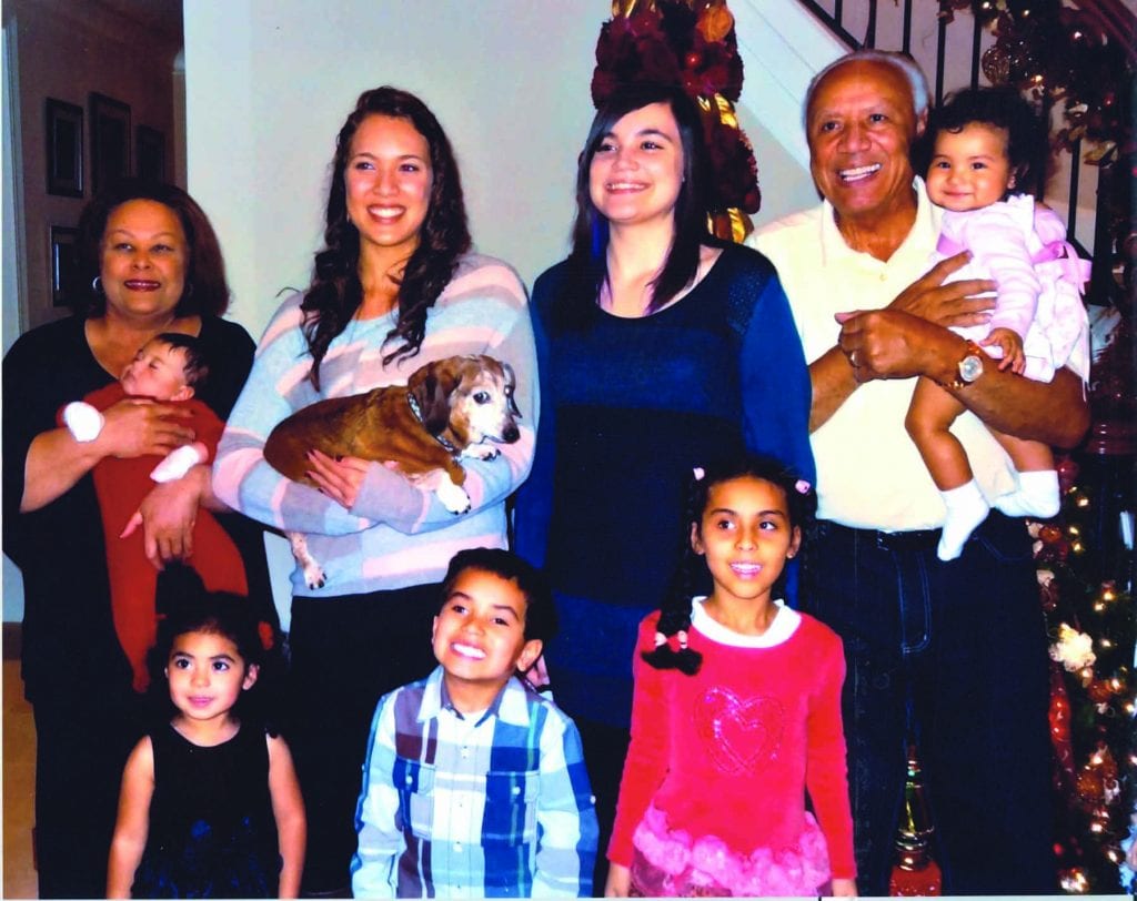 Lenny and Marilyn Wilkens with their seven grandchildren.