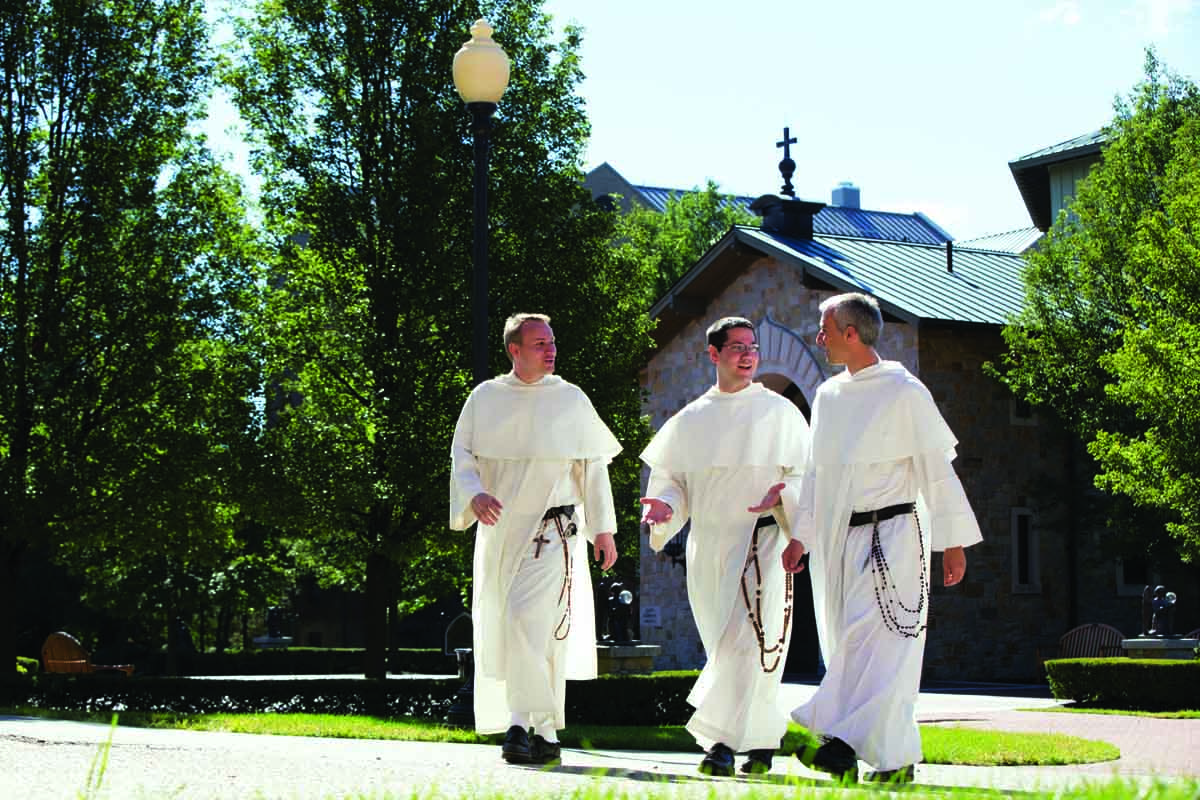 Rev. Peter Martyr Yungwirth, O.P., chaplain, at center, with his assistants, Rev. Philip Neri Reese, O.P., left, and Rev. Dominic Verner, O.P., outside St. Dominic Chapel.