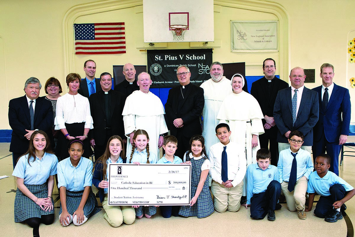 Father Shanley and officials from the Diocese of Providence at St. Pius X School.