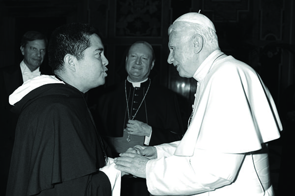 Rev. Nicanor Austriaco, O.P., left, meets Pope Benedict XVI in 2011 while in Rome at a Vatican conference on adult stem cells.