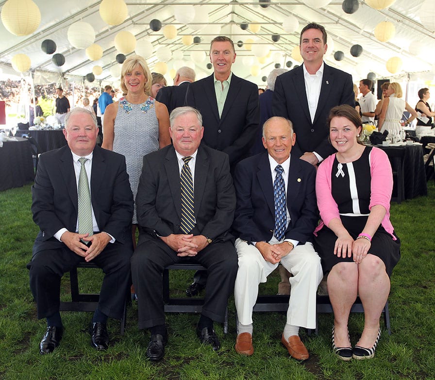 Recipients of National Alumni Association awards at Reunion Weekend 2013 are, front row from left, Philip V. Robey ’68, Paul V. Robey ’68, Thomas M. Murphy ’63, and Katie Breen ’08, and rear, Kathleen A. Calenda, M.D. ’78, Dr. John E. Deasy ’83, and Michael P. Sullivan ’88.