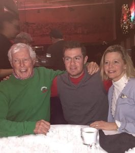 Enjoying a Christmas get-together are, from left, Edward J. McCormick ’57, Patrick J. Healey ’17, and Kathleen McCormick Healey ’84.