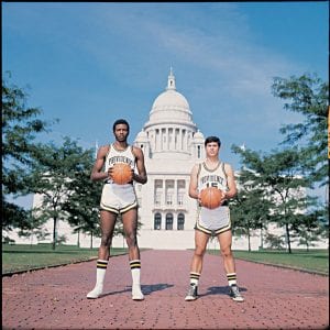 Marvin and teammate Ernie DiGregorio ’73 on the cover of the basketball media guide for 1972-73.