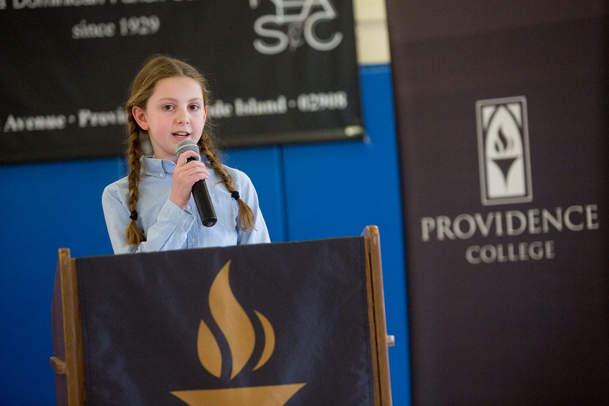 Catherine Galipeau, a fifth grade student at St. Pius V School, explains why she enjoys attending a Catholic school.