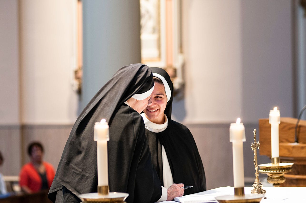 Sister Sophia at the altar during her perpetual profession as a Dominican Sister of Saint Cecilia.