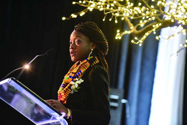 Marie-Florence Koikou ’16 speaks at a dinner during St. Dominic Weekend in October 2015.