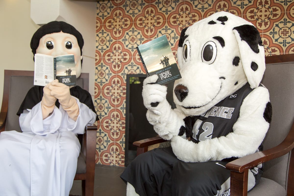 Friar Dom and Huxley start their summer reading with Joshua Davis’ Spare Parts, the Common Reading Program selection for the 2017-18 academic year. 