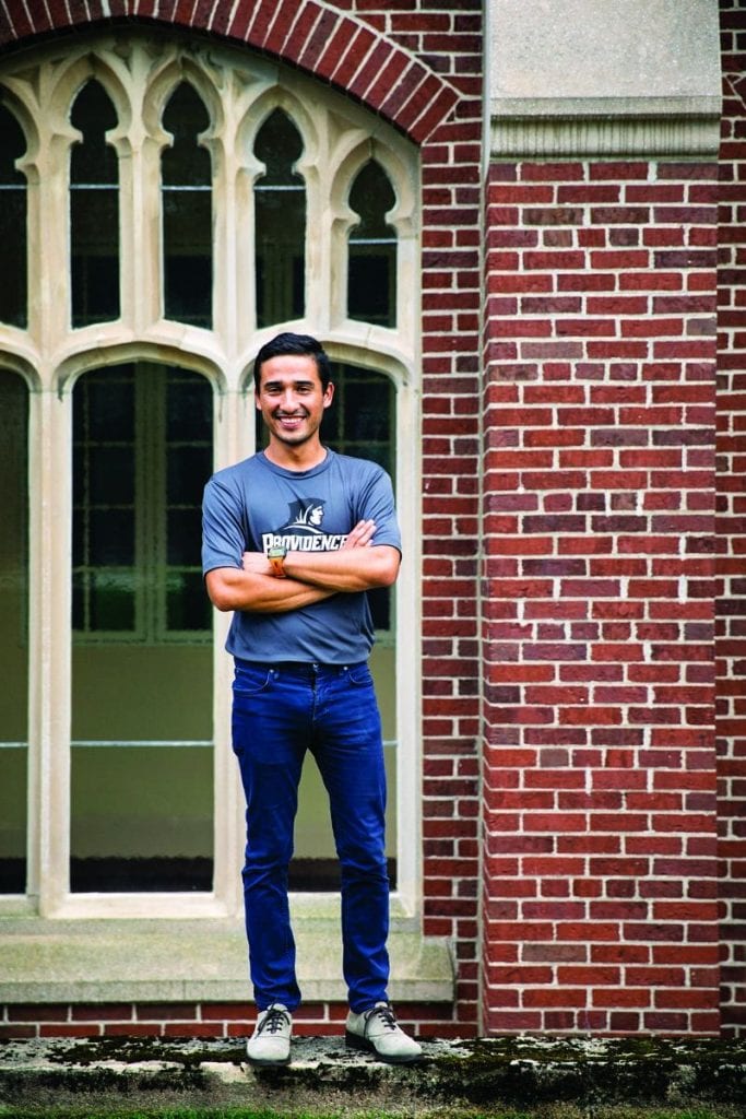 Heriberto Castro '18, an economics major, outside Harkins Hall