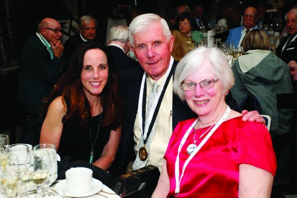 John T. Mitchell ’67, who received a Faithful Friar Award from the National Alumni Association, relaxes at the Golden Friars Dinner with his daughter, Margaret Mitchell Moore ’94, left, and his wife, Sara Mitchell. 