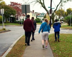 Students and youths look for subjects to photograph in the city's Mount Pleasant neighborhood. Photo by Payton Morse '20