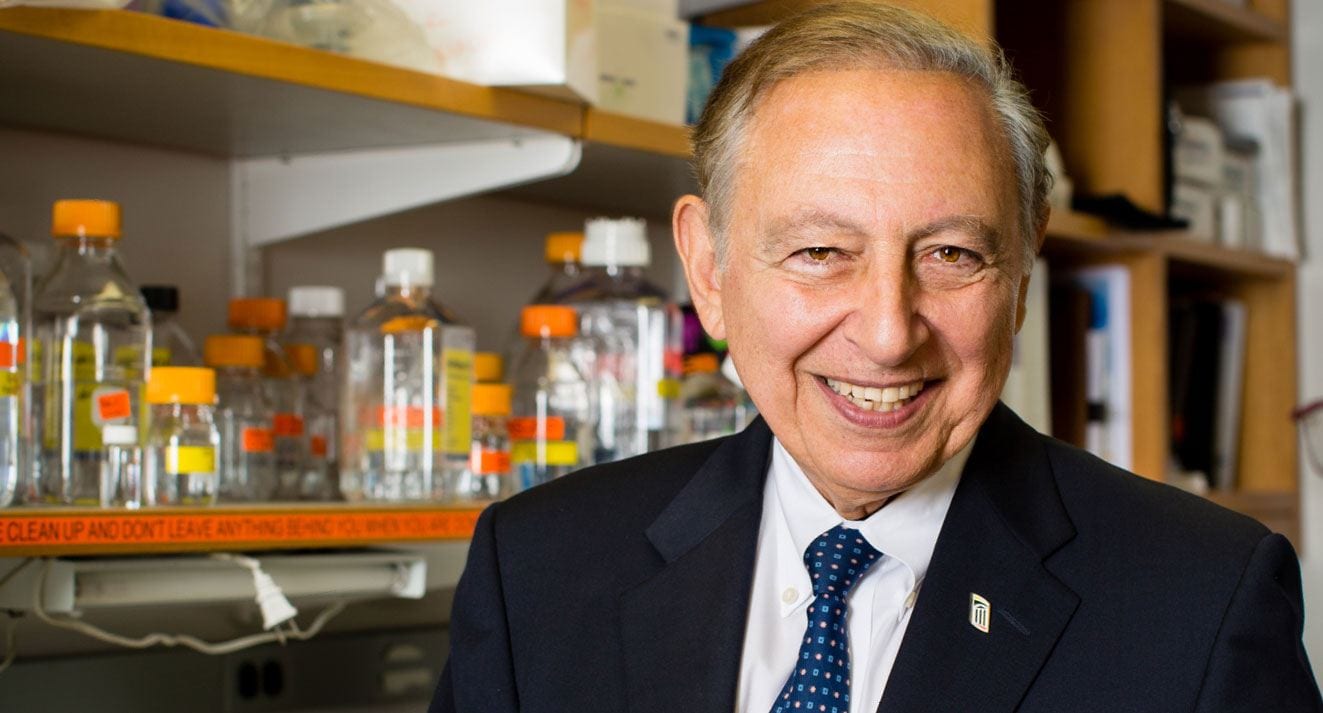 A gift from biomedical researcher Robert C. Gallo, M.D. ’59 & ’74Hon., here, and his wife, Mary Jane Gallo, will create a fellowship program in global health for PC students. (Photo courtesy of Institute of Human Virology)