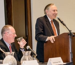 Dr. Gallo, right, speaks at a PC Centennial Presidential Speaker Series panel discussion in March 2017. At left is panelist Paul Farmer, M.D., co-founder of Partners in Health. 