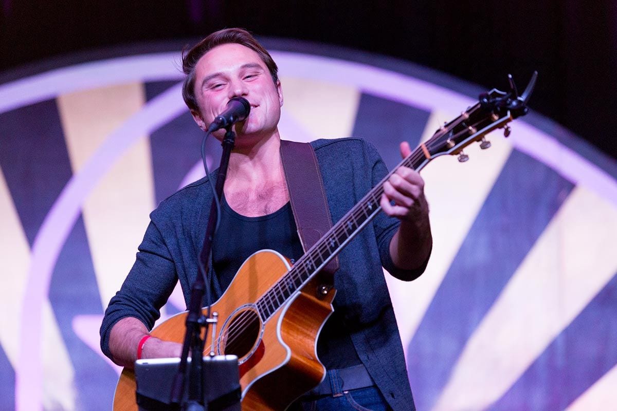 Adam Hanna '18, a singer and songwriter, takes the stage to entertain at FriarCon.