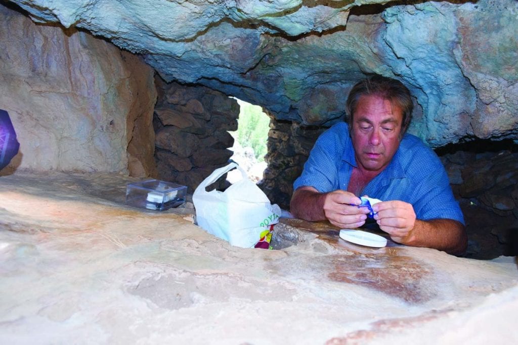 Dr. Thomas F. Strasser does some final analysis on the engravings in the Asphendou Cave in Crete in summer 2017.