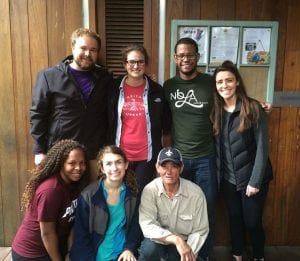 Ron De La Rosa '18, standing, second from right, took part in the NOLA immersion service project in New Orleans over winter break with other PC students and members of the Campus Ministry staff.
