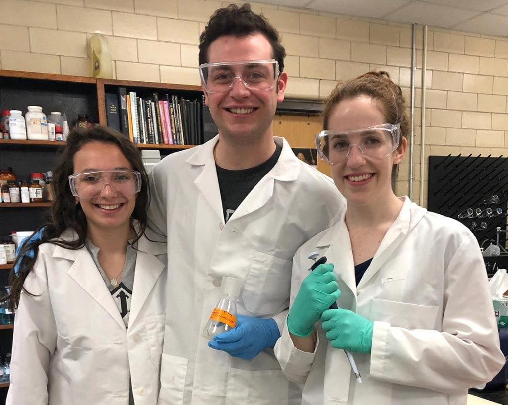 From left, Grace Grimaldi '19, Colin Scano '19, and Amy Conte '19 are summer researchers in the chemistry lab of Dr. Katheen A. Cornely.