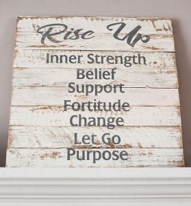 This sign sits on a mantel in the Kanes’s home.