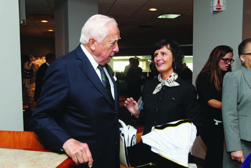 Lisa M. (Thibault) Schenck '83 & '18Hon. chats with another honorary degree recipient, author and historian David McCullough '18 Hon.