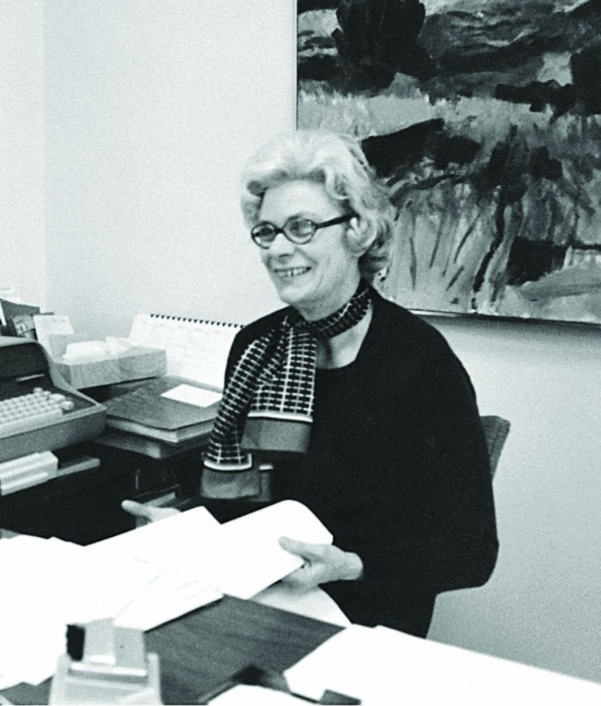 Kay Dillon at work in the president’s office at Harkins Hall, in a photo dated 1976.