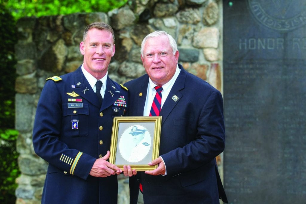 In June 2018, 23 years after his ROTC commissioning, in June 2018, Ryan Dillon '95 returned from service in Iraq to see his father honored by PC’s National Alumni Association. Ryan and Gerry hold a portrait of James Dillon ’33 & ’35G — Ryan’s grandfather and Gerry’s father — who was a Navy commander.