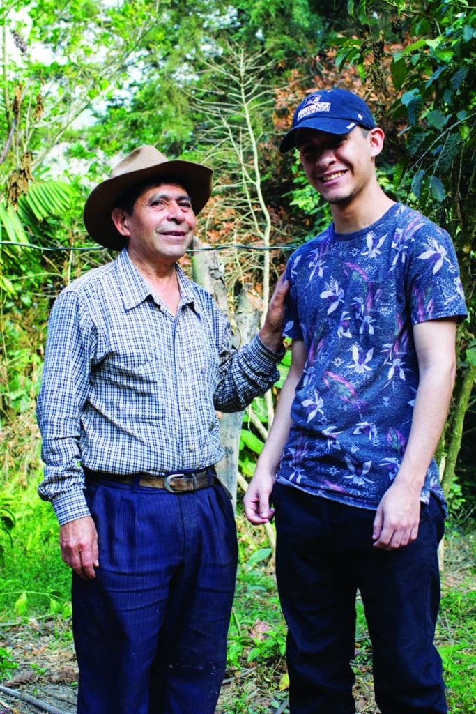 Joshua Santos '20, right, stands beside Toribio, the director of the reforestation project in San Lucas Tolimán.