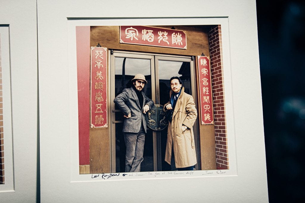Jazz and blues vocalist Leon Redbone, left, with John Chan '74 outside Chan's in 1981.