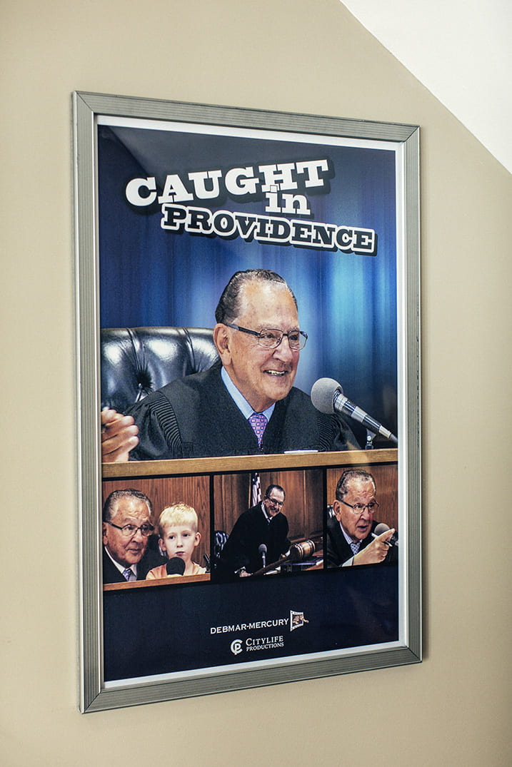 An advertisement for Caught in Providence, the show hosted by Judge Frank Caprio '58 & '08Hon. About 180 local affiliates, including those owned and operated by Fox Television, broadcast the program.