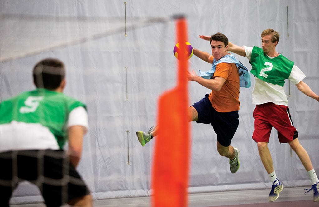 David Chinappi ’16 prepares to fire the ball toward the net as Darragh Quinn ’17 tries to stop him in team handball.