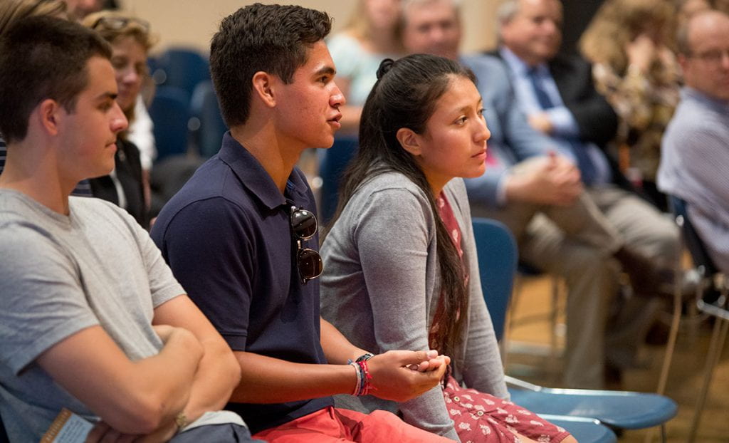 Trevor Wakefield '20, center, asks Rev. Gregory Boyle, S.J. how he copes with the death of young people he helps through is organization, Homeboy Industries.