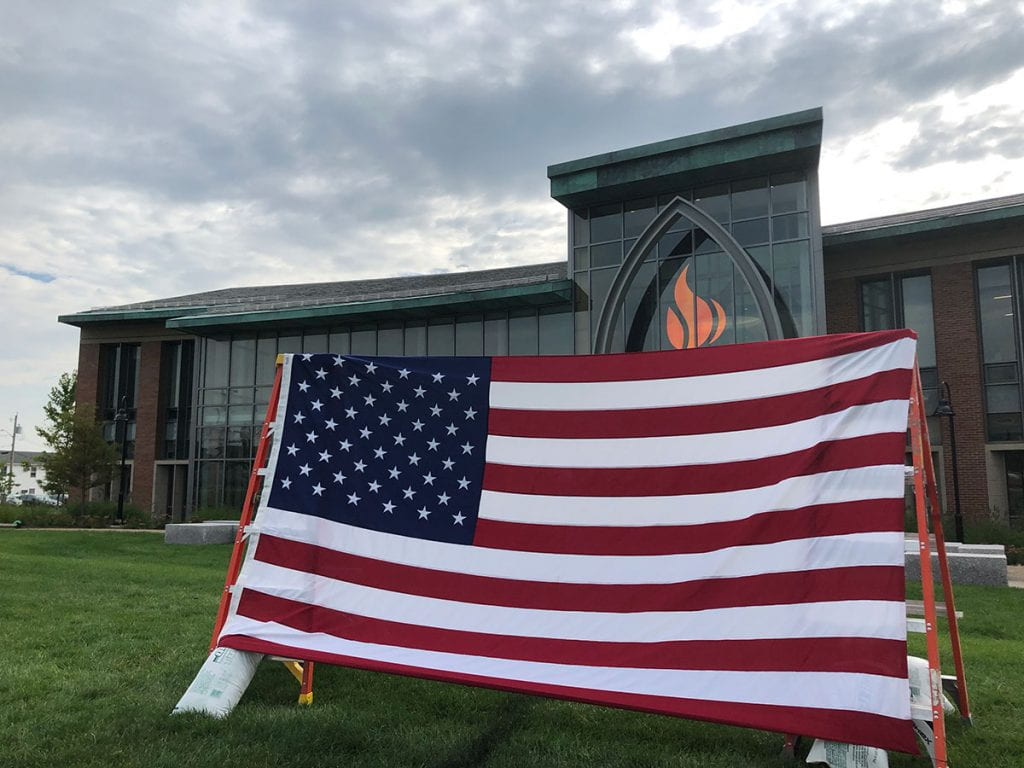 The American flag outside the Arthur F. and Patricia Ryan Center for Business Studies, part of a 9-11 commemoration by College Republicans.