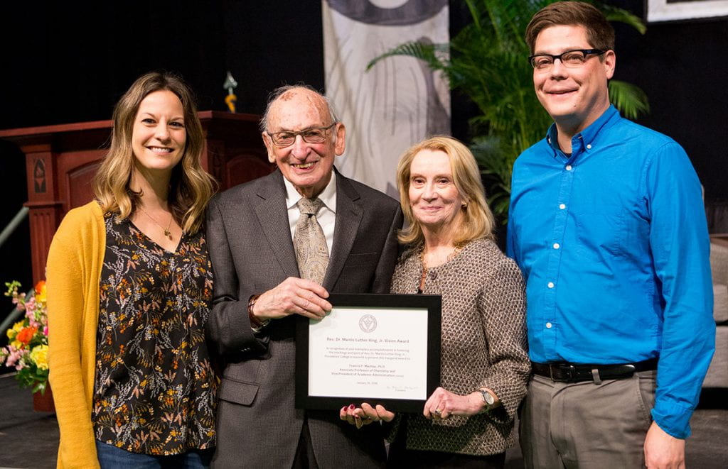 Dr. Francis "Pat" MacKay and his wife, Jacqueline F. Kiernan MacKay, hold the MLK Vision Award he received in 2018. With them are their niece, Abbey Bernier, and nephew, Ben Sweeney.