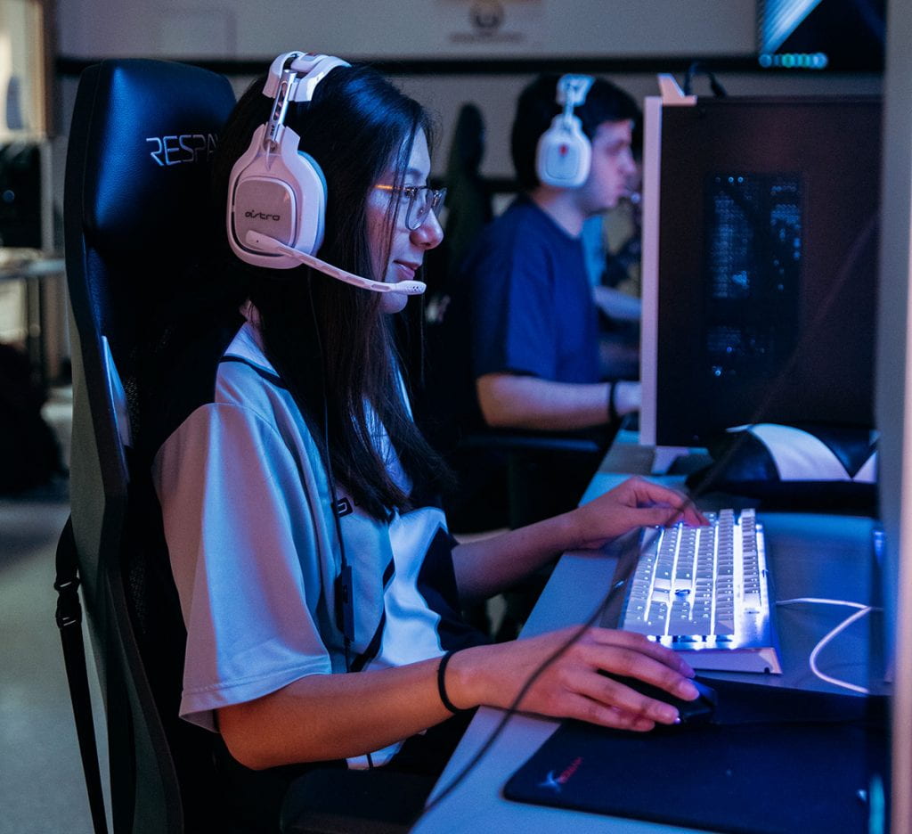 Idette Monterroza '20 uses a gaming computer in the College's new esports room in Slavin Center. She is a member of the Overwatch team.