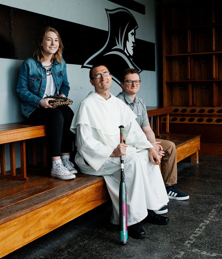 Rev. Humbert Kilanowski, O.P. has been a baseball fan since childhood. Now an assistant professor of mathematics at PC, he has developed a research course, Sabermetrics: The Mathematical Analysis of Baseball. With him are students Kristy McSweeney '22 and Connor Smith '21.