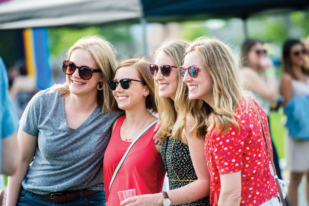 Pausing for a souvenir during the reunion barbecue are, from left, Victoria Allen ’09, Erin DeStefanis ’09, Blathnaid Mahon ’09, and Erin Lanni ’09.