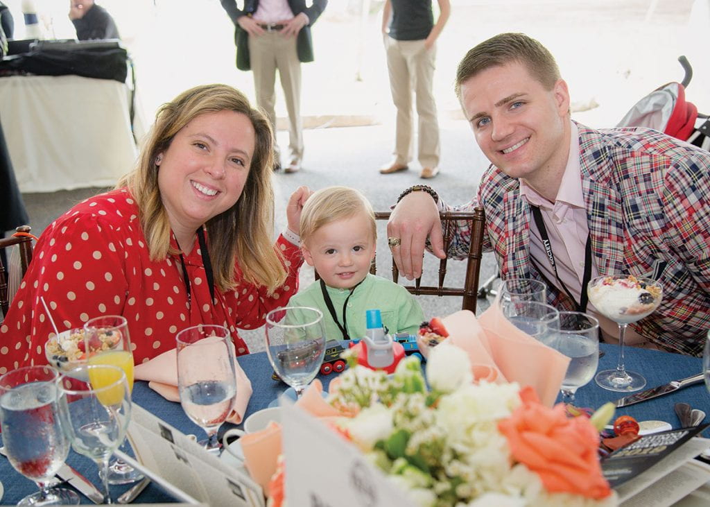 Andrea Urrutia Hessenius ’09 and Christopher J. Hessenius, Jr. ’09 give their son, Christopher J. Hessenius, III, a taste of Friartown at the National Alumni Association Awards Brunch. Andrea and Christopher were presented with the Rev. Philip A. Smith, O.P. Award. Friar Explorations Alumni Travel Pro