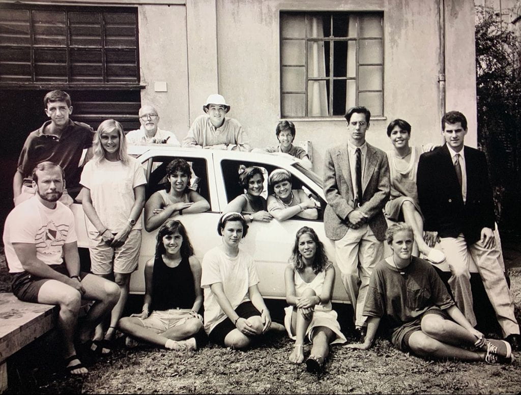 Students and faculty in the Pietrasanta program pose for a group photo in summer 1989. Father McAlister is second from left at rear. At front left is current College President Rev. Brian J. Shanley, O.P. '80. Stephen J. Forneris '90, who contributed this photo, is leaning on the car, third from right.