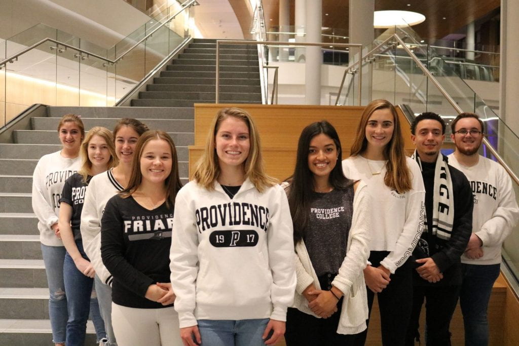 PC social media ambassadors stand in a line in the Ryan Center Atrium