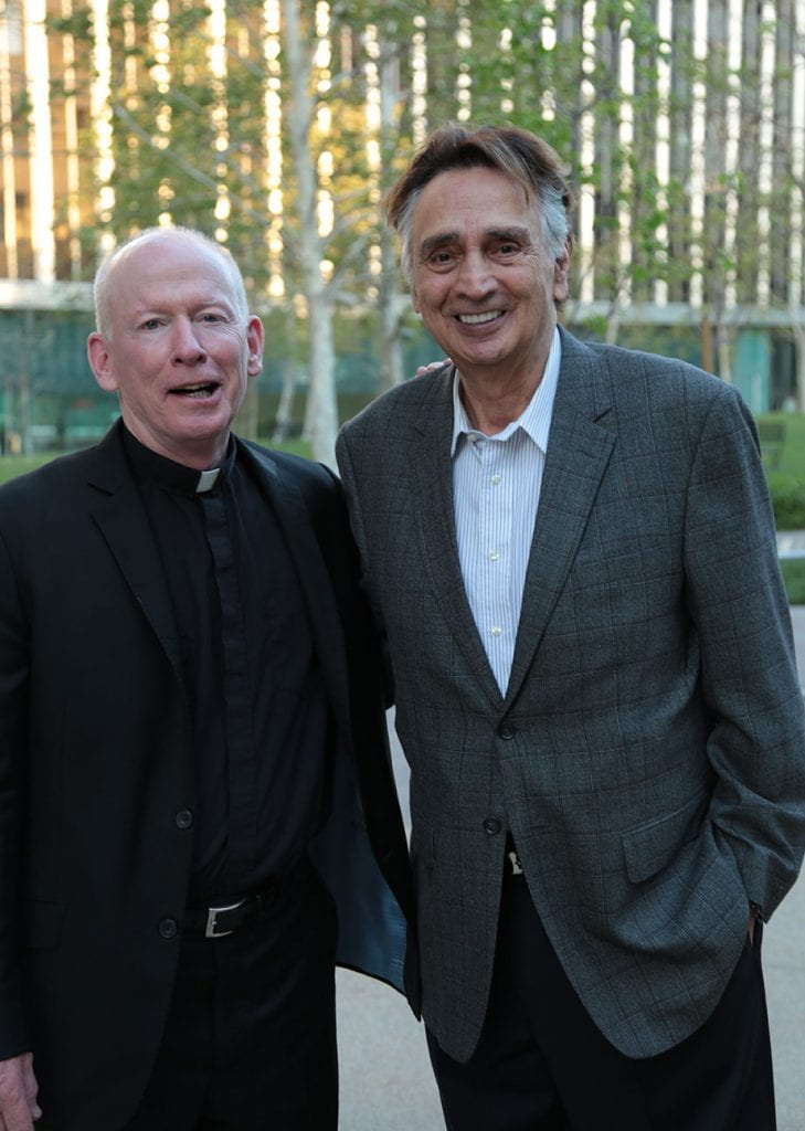 John Bowab ’55 & ’89Hon. meets with College President Rev. Brian J. Shanley, O.P. ’80 during an alumni event in Hollywood in May 2018.