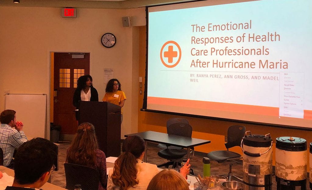 Presenting a paper at the Department of Health Policy and Management’s annual undergraduate research conference in 2019 are, from left, Ranya Perez of Kalamazoo College and Ann Gross Almonte ’19, who is now studying for a master’s degree in public health at Northeastern University. The conference is one of the outcomes of the Canavan Family Fund in Medical Ethics.