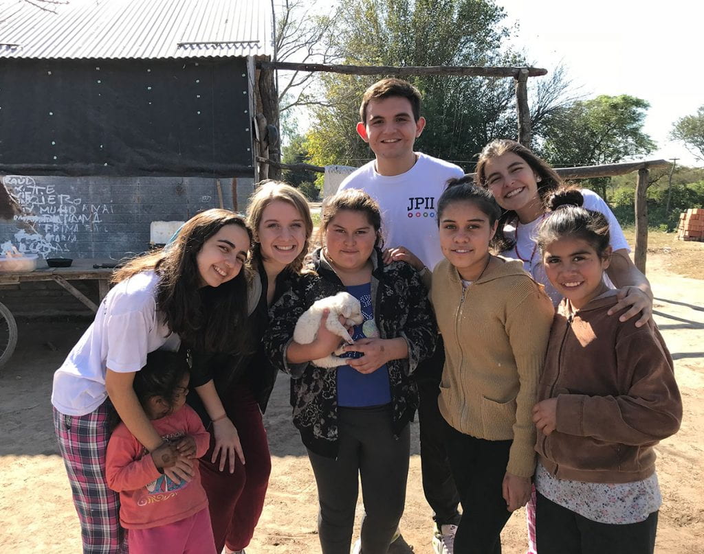 Julia Gaffney ’20 visits children in a rural community during her Father Smith fellowship experience in Argentina.