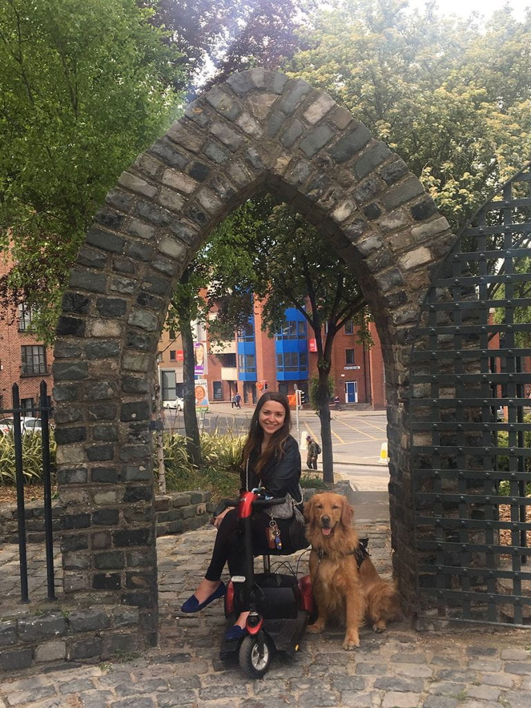 Jacquie Kelley '20 and Moose, the golden retriever, at University College Dublin