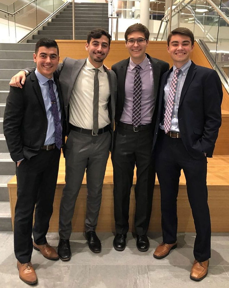 Nathan Perez ’20, second from left, was a member of the winning team in the 2019 Michael Smith Regional Ethics Case Competition sponsored by the PC School of Business. He is joined by teammates, from left, Daniel Bonner ’20, Shawn McDermott ’20, and Alec DiCiaccio ’20.