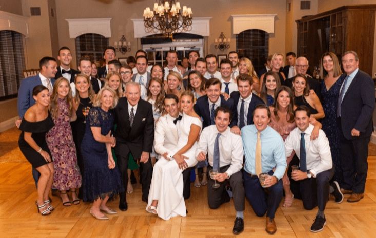 Friars, family, and friends join Kevin C. Entwistle ’15 and Elisabetta DeWitt ’15 at their wedding reception.