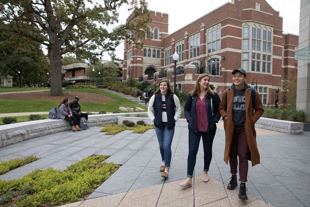 Victoria Haak '20 says she fell in love with the Providence College campus during her first visit as a high school senior. "It was this feeling of family and love that I don’t think I had anywhere else," she said. She is shown with Anna LaFortune '22, left, and Hieu Nguyen '22.