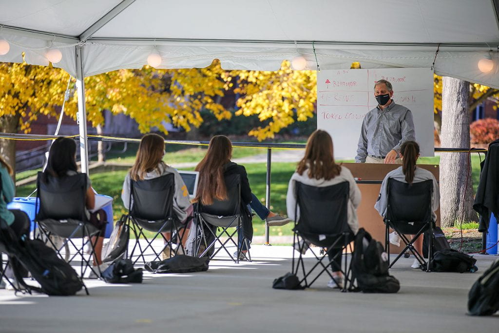 outdoor classroom near the Smith Center quad with autumn leaves on trees